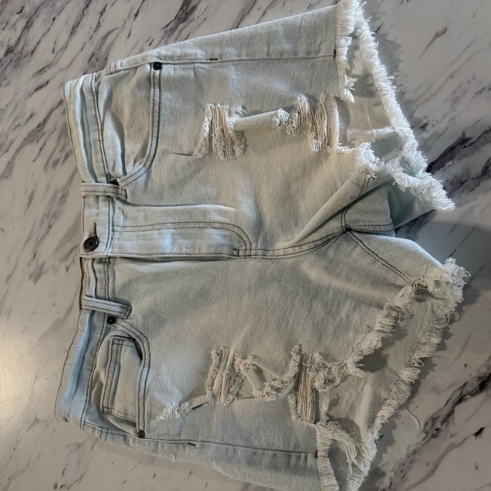 Distressed Light Denim Shorts